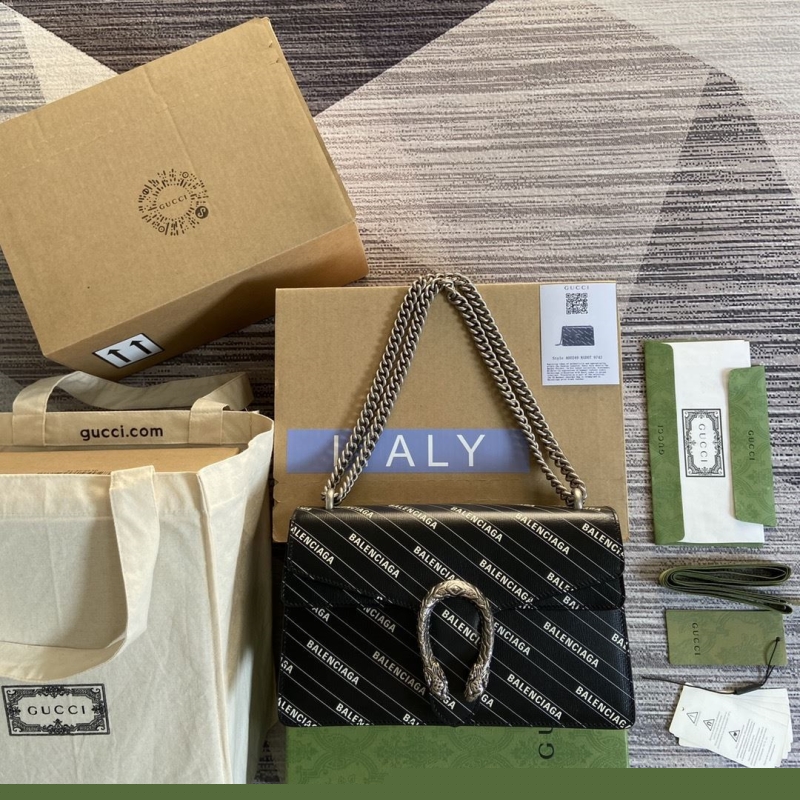 G*u*i top handle bags